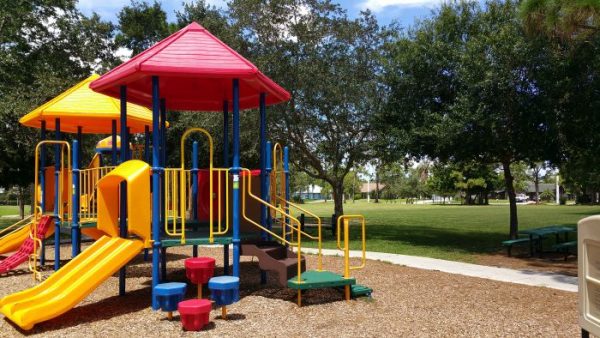 Kiwanis Park on Floresta Dr, showing playground and play grass playing fields
