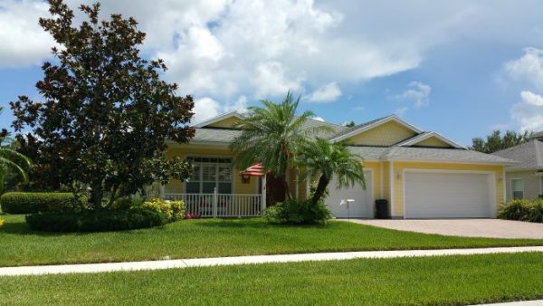 River Place 1 story home with 3 car garage and large yard