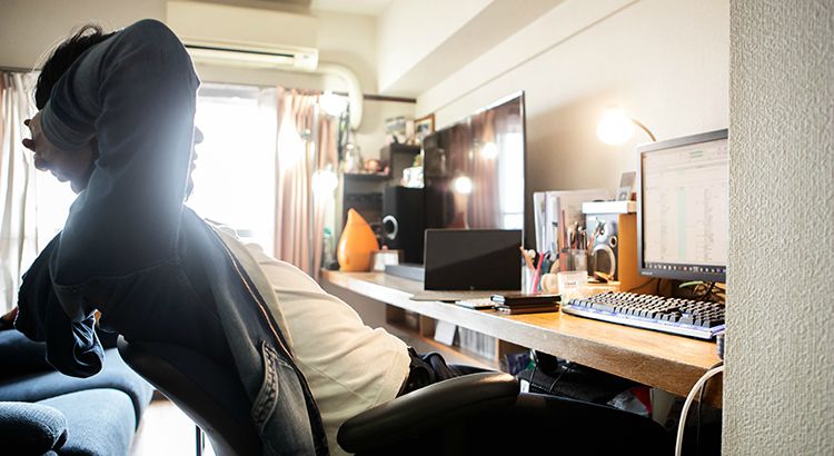 Homebuyer needs have changed with remote work - 30's male working at home desk