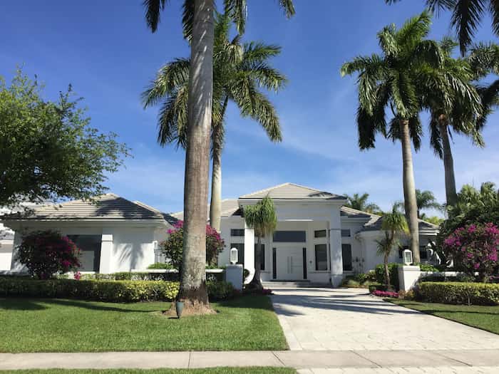 Patience is Key to finding your home in 2021 - white contemporary luxury home 