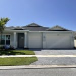 Del Webb singe story home with 3 car garage in a 55+ community that is very popular with relocating downsizers
